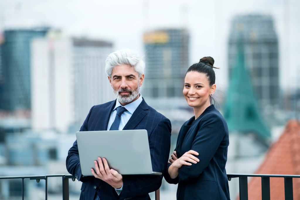 A businessman and businesswoman
