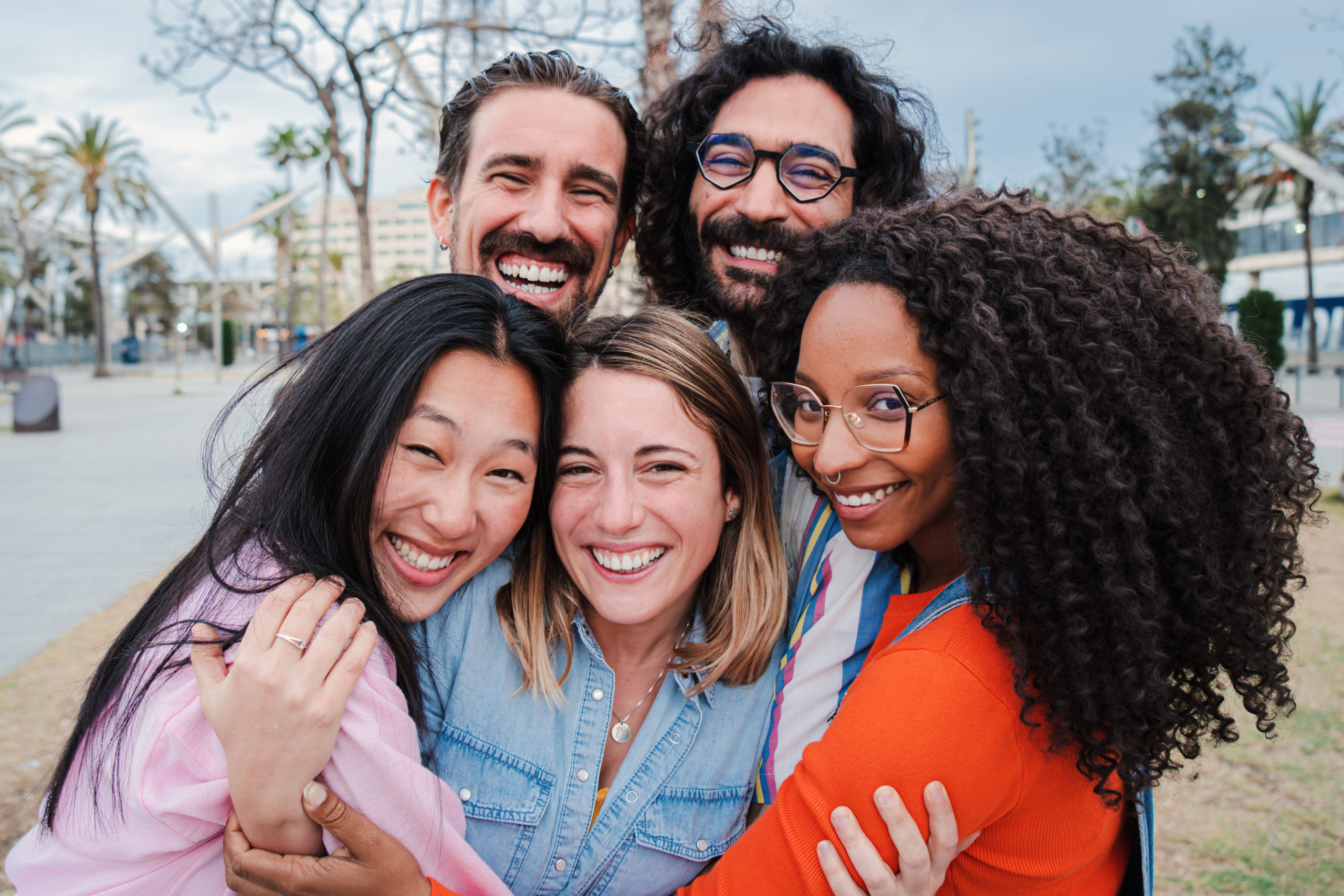 Group of joyful young adults