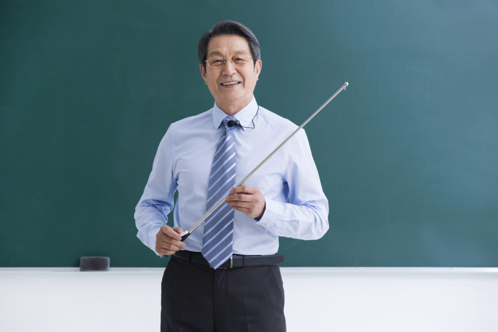 Chinese Professor Teaching in Classroom
